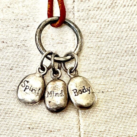 sterling  Silver charm necklace on cord Jewelry - Sterling Silver charm necklace on brown cord